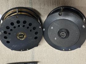 Two Shakespeare fixed spool fishing reels
