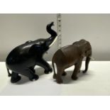 Two hand carved wooden elephants