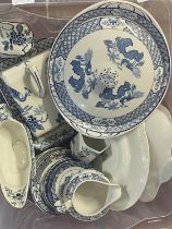 A large selection of Yuan blue & white bone china. shipping unavailable