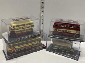 Four assorted Corgi die-cast bus models