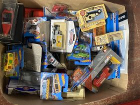 A large job lot of assorted boxed die-cast models including Hotwheels