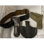 A leather gun belt and cartridge holder and two WW2 period gun holsters
