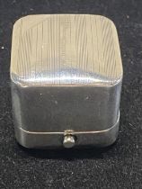 An unusual hallmarked silver thimble case