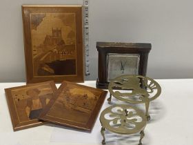 A selection of collectibles including brass trivets & barometer.