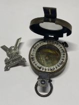 A WW2 period military compass & Lowlands Regiment cap badge.