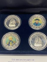 A cased silver four coin proof set celebrating the Bicentenary of the battle of Trafalgar