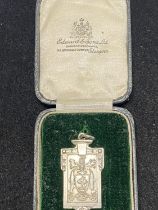 A hallmarked silver medal for 1930 for the bakers & grocers exhibition