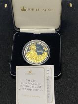 A limited edition solid silver & gold plated 2015 commemorative coin