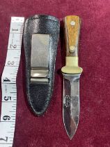 A A.G. Russell knife with a wooden handle & leather sheath. Blade length 8.5cm. over 18's / UK