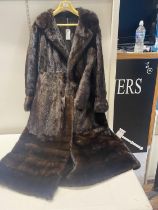 A full length Ladies real fur coat. no size.