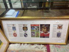 A framed print depicting the history of football team badges etc. 93cm x 40cm. shipping unavailable