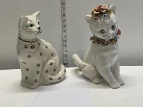 Two ceramic cat figures largest 32cm tall.