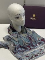 A boxed Liberty silk scarf, some small marks to the box.