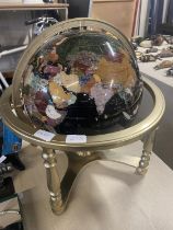 A large Jem stone globe on a brass stand. Globe is 40cm in diameter. No shipping