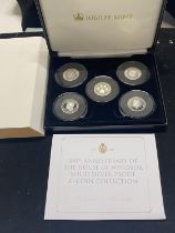 A set of five solid silver £1 proof coins celebrating the 100th anniversary of the House of Windsor