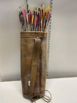 A large selection of archery arrows (sold as seen) in a leather pouch