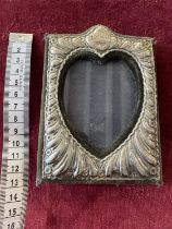 A antique hallmarked silver photo frame 13x9cm monogrammed.