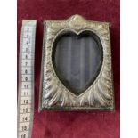 A antique hallmarked silver photo frame 13x9cm monogrammed.