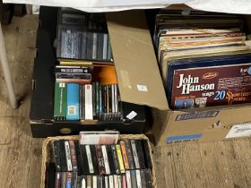 A box of mixed genre LP records, cassettes and CD's, shipping unavailable