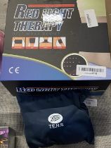 A boxed red light therapy belt wrap device and a tens machine (untested)