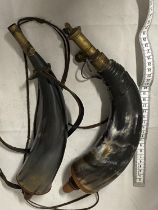 Two antique black powder horn flasks