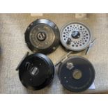 Four assorted fly fishing reels