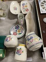 A good selection of assorted Poole pottery, shipping unavailable