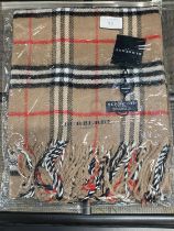 A new with tags Burberry 100% lambs wool tan shawl 206 x 70cm