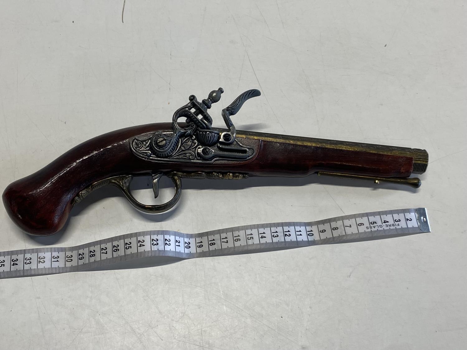 A good quality reproduction wall hanging flintlock pistol, over 18's only, UK post only
