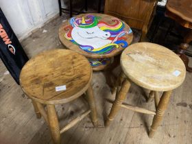 A vintage wooden table and two wooden stools shipping unavailable.