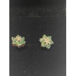 A pair of 9ct gold, emeralds & diamond earrings.