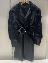 A vintage Ladies leather & fur 3/4 coat. No size