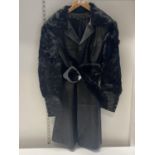 A vintage Ladies leather & fur 3/4 coat. No size