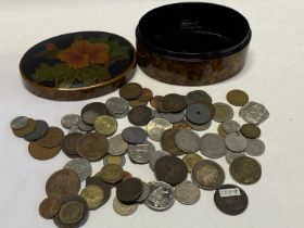 A Papier Mache box and contents of old world and British coins etc