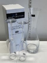 A Dartington glass decanter and two champagne flutes, shipping unavailable
