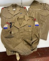 Two sets of sets of 1949 pattern battledress and trousers, both with Royal