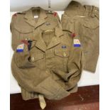 Two sets of sets of 1949 pattern battledress and trousers, both with Royal