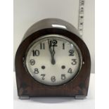 A Art Deco period mantle clock with key and pendulum, shipping unavailable