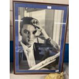 A framed print of Elvis Presley 75x55cm, shipping unavailable