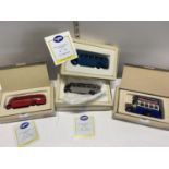 Four boxed Corgi die-cast bus models