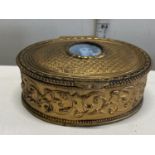 A antique gold toned trinket box