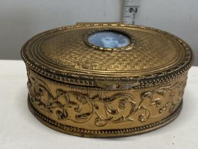 A antique gold toned trinket box