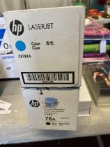 Two HP laserjet ink cartridges one Cyan and one Black