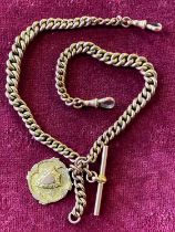 A antique 9ct gold double albert chain with T-bar and Fob, 32.61g