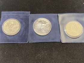 Three assorted collectable £5 proof coins