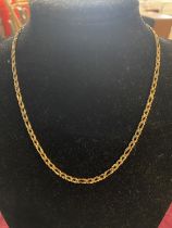 A 9ct gold necklace 14.54g