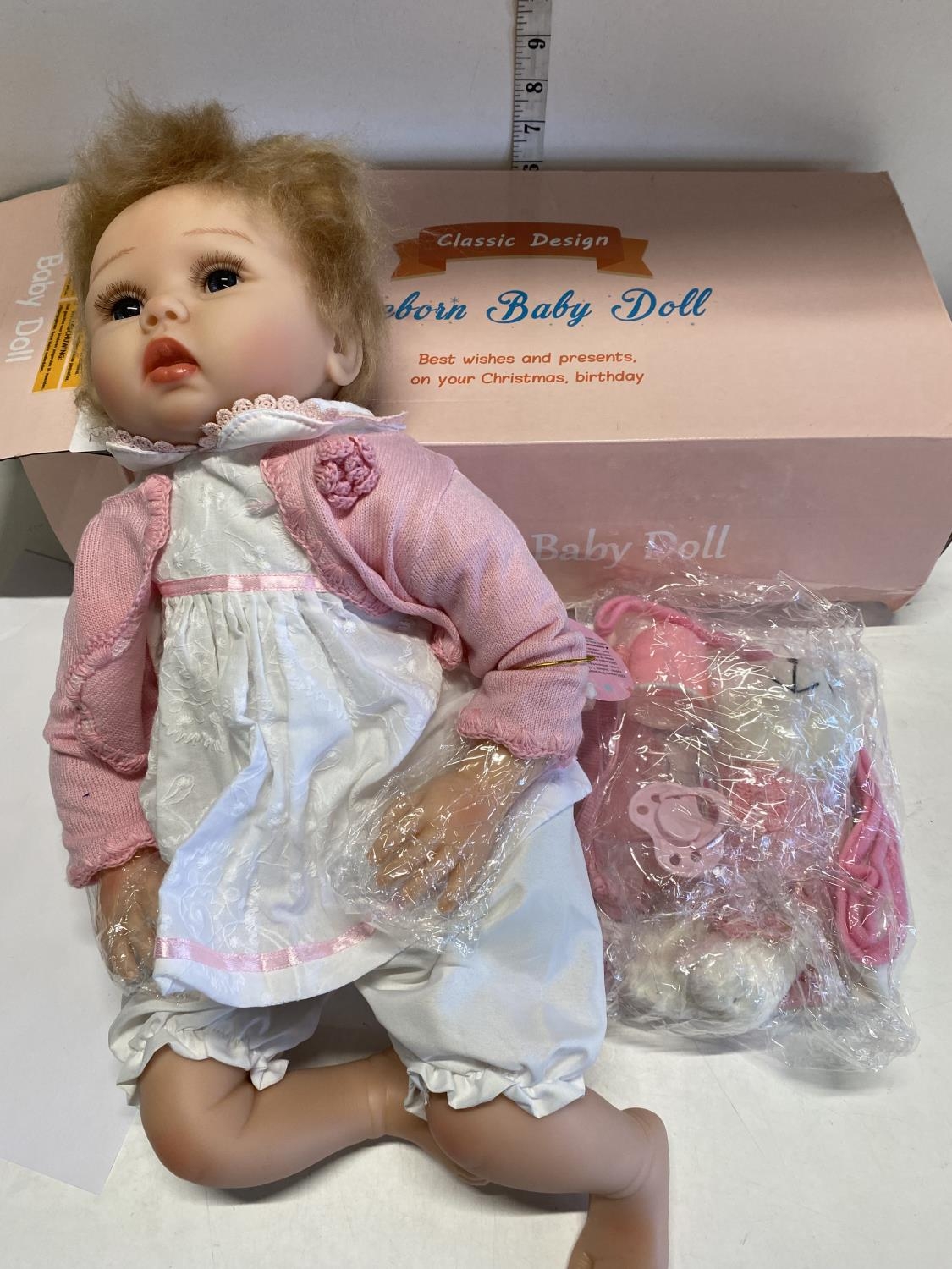 A boxed Reborn baby doll