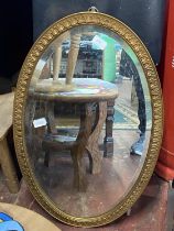 A vintage gilt framed mirror 75x46cm. shipping unavailable