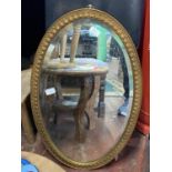 A vintage gilt framed mirror 75x46cm. shipping unavailable