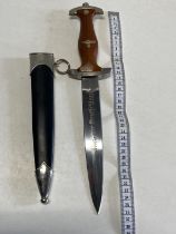 A reproduction German third Reich dagger and sheath, over 18's only, UK post only